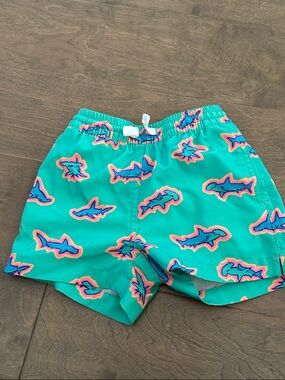 chubbies Teal Shark-Print Swim Shorts with Pink & Blue Shark design